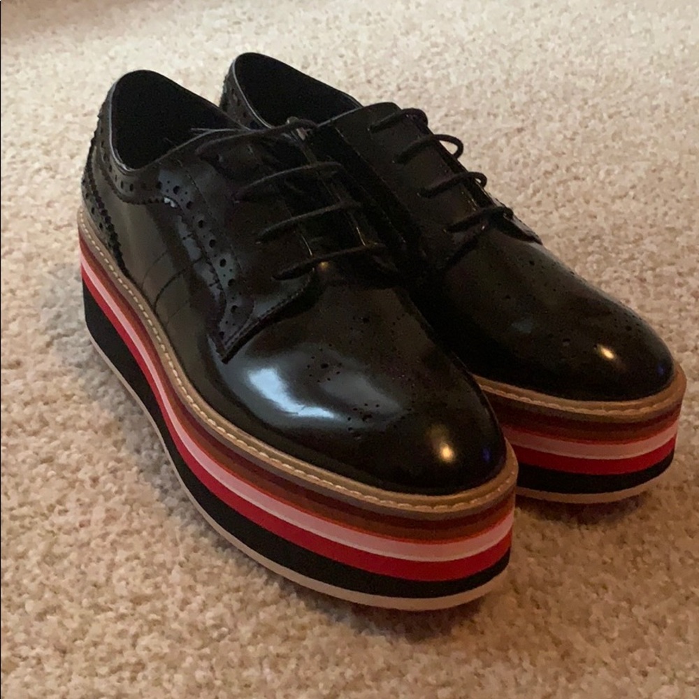 Black platform loafers with multi-color
